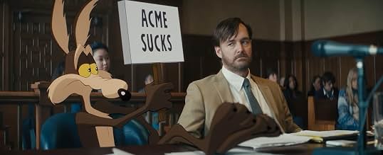 Wile E. Coyote and Kevin Avery in a courtroom, with a sign reading ACME SUCKS